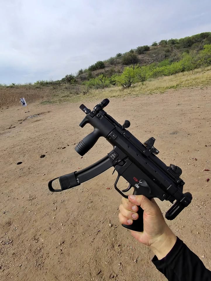 Compact submachine gun at an outdoor range